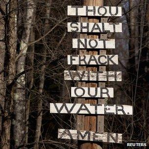 Protest sign in New York forest