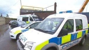 Police outside a scrap metal dealers in Barnsley