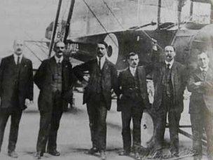 Early photo showing founder of the airfield, Tom Dutton, seen third right