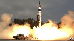 India’s Agni-V missile, with a range of 5,000km (3,100 miles), lifts off from the launch pad at Wheeler Island off India's east coast