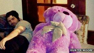 Hunter Moore with a teddy bear