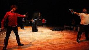 Actors from the Iraqi Theatre Company rehearse a scene from Romeo and Juliet