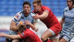 Alex Cuthbert goes over