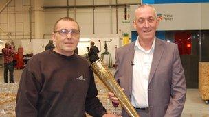 Gary Mitchell (left) and Gez Halton with an Olympic torch