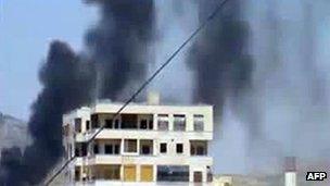 Screengrab of video purportedly showing smoke rising from Syrian city of Hama (23 April 2012)