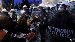 Protesters and police in Athens