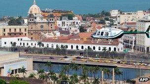 A helicopter flies over Cartagena during preparations for the Summit of the Americas on 12 April