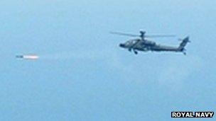 Apache fires Hellfire missile