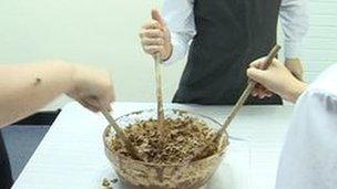 Children making a cake