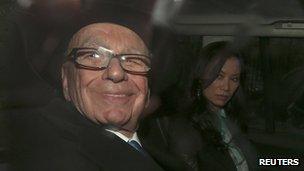 Rupert Murdoch being driven away after giving evidence to the Leveson Inquiry