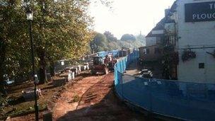 Flood defences being built in Upton upon Severn