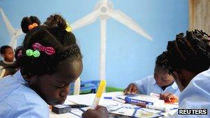 Children and wind turbine