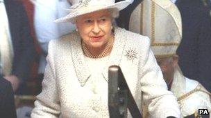 The Queen is watched by the congregation as she leaves after a service at Llandaff Cathedral, Cardiff