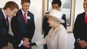 The Wales rugby squad shake hands with the Queen