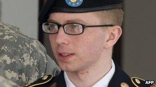 Pte Bradley Manning leaves the courtroom in Fort Meade, Maryland 25 April 2012