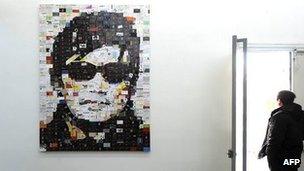 An art work featuring blind human rights activist Chen Guangcheng on displayed at the 798 art district in Beijing, 09 Jan 2012