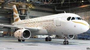 BA gold-painted aircraft