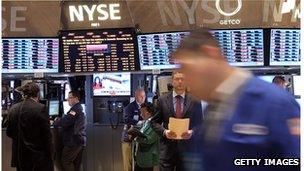 Traders on floor of New York Stock Exchange