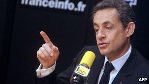 Nicolas Sarkozy takes part in a show of French news radio station "France Info", on April 25, 2012 in Paris