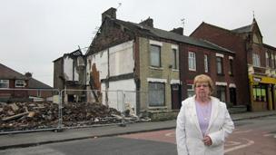 Maureen Walsh outside her house