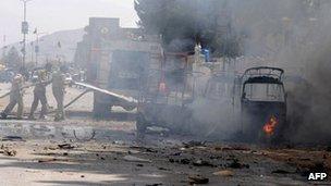 Pakistani firefighters extinguish burning auto-rickshaws after a bomb explosion in Quetta (file photo)