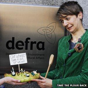 Protester, pasty and government sign