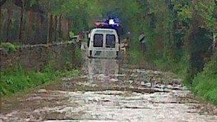 School minibus trapped in floodwater in Peterchurch, Herefordshire