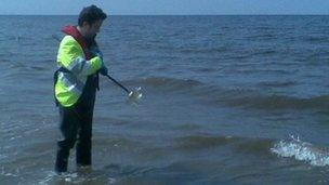 EAW officer takes samples in Clwyd Estuary