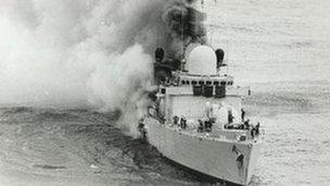 HMS Sheffield on fire after being hit by an Argentine Exocet missile