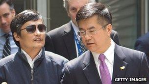 Chen Guangcheng (L) talks with US Ambassador to China Gary Locke on May 2 2012 in Beijing