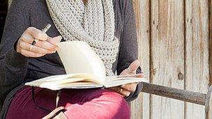 Woman writing diary