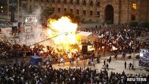 A view shows the explosion of gas-filled balloons during a campaign rally in the central Republic Square in Yerevan, May 4, 2012.