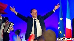 French President-Elect Francois Hollande celebrates victory in the place de la Cathedrale on May 6, 2012 in Tulle, France