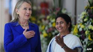 US Secretary of State Hillary Clinton (L) talks with India"s West Bengal state Chief Minister Mamata Banerjee at the Writers" Building, which houses the state secretariat, in Kolkata on May 7, 2012.