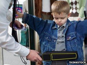 Boy going through security