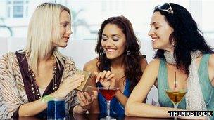 Group of women drinking (library image)