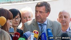 Professor Lutz Harms briefs journalists outside the hospital in Kharkiv where he is treating Yulia Tymoshenko