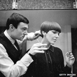 Clothes designer Mary Quant, one of the leading lights of the British fashion scene in the 1960's, having her hair cut by another fashion icon, hairdresser Vidal Sassoon.