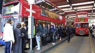 People getting on a bus