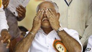 Bharatiya Janata Party leader BS Yeddyurappa reacts during a function to felicitate him before he submitted his resignation in Bangalore on July 31, 2011