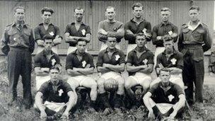 Wales football team at Auschwitz - Mr Jones is in the middle of the back row