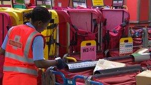 Postal worker at Royal Mail sorting office in London