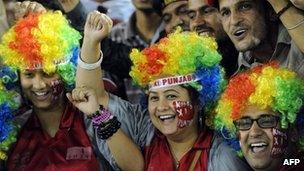 Kings XI Punjab fans cheer prior to the start of the IPL Twenty20 cricket match between Kings XI Punjab and Kolkata Knight Riders at PCA Stadium in Mohali on April 18, 2012.