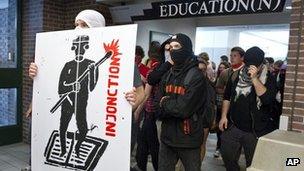 Protesters march through a university in Montreal, Canada 16 May 2012