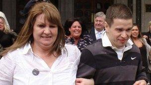 Sam Hallam, 24 leaves the Court of Appeal in London, with his mother Wendy, after he was freed on bail