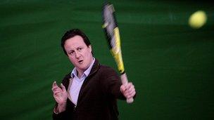 David Cameron playing tennis