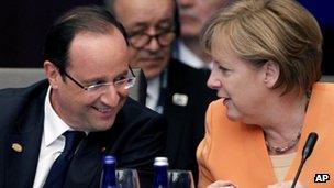 Francois Hollande and Angela Merkel at the Nato meeting in Chicago, 20 May 2012