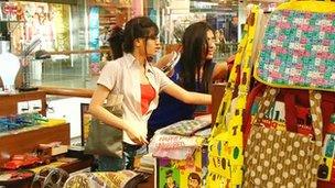 Young Indian ladies shooping in a Happily Unmarried store