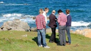 Students on Guernsey's coast