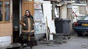 A woman enters a Roma camp outside Paris (file pic from 2007)